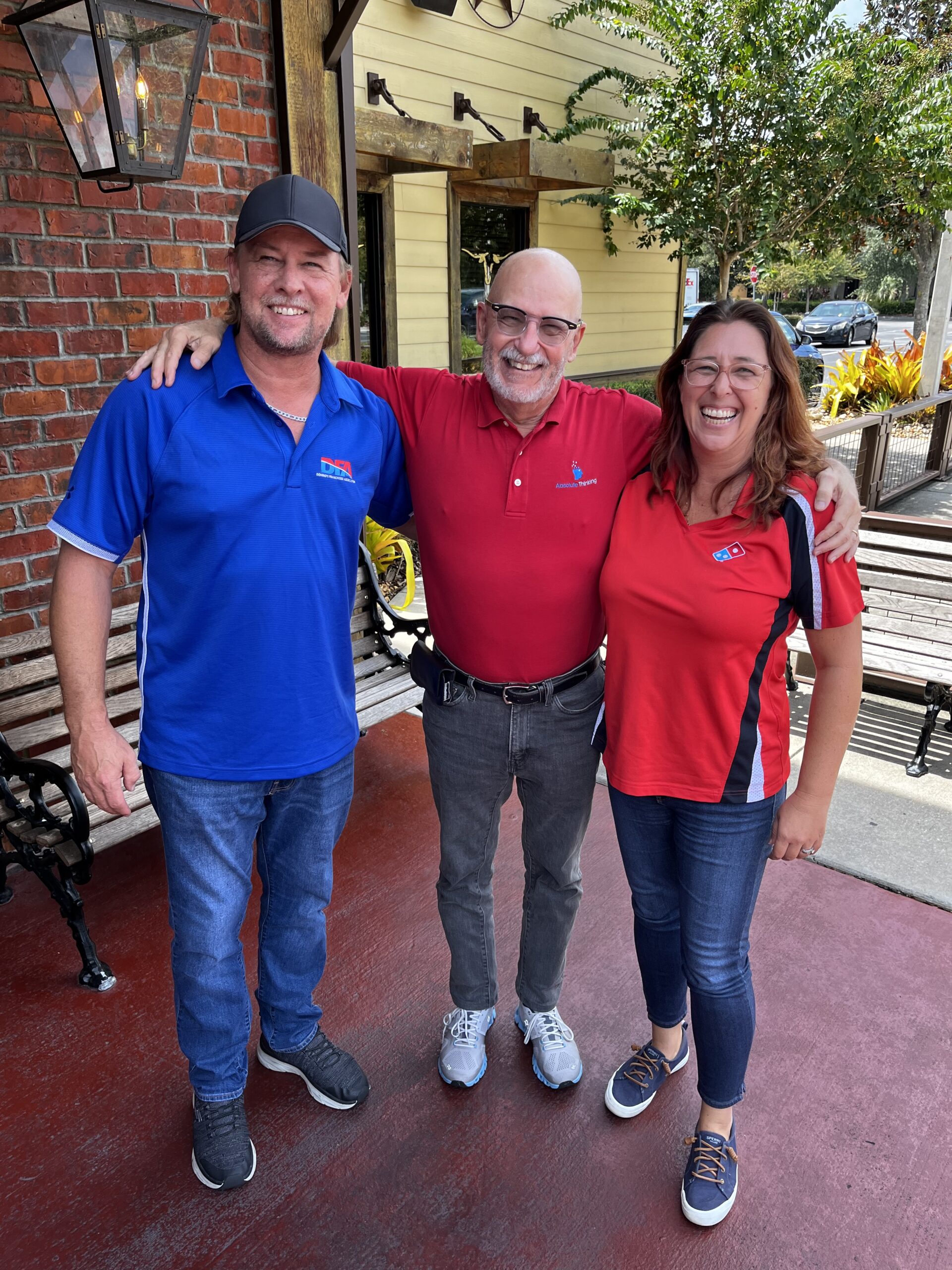 Rick and Cindy Traenkner, franchise owners of 22 Domino’s Pizza stores, with Ed Gilbert, Board Chair of The Lifeboat Project.