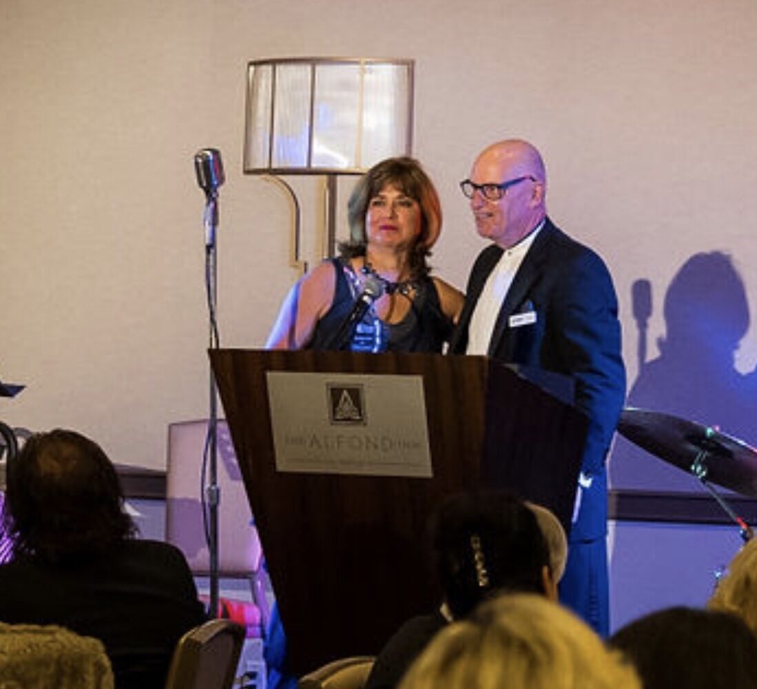 Vicky Jaramillo from GOAA receives the first annual ‘Guardian Award” from Ed Gilbert, Board Member at the Alfond Inn November 14