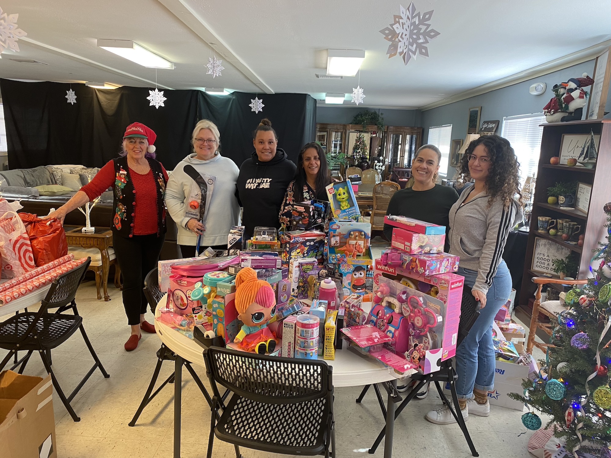 The Lifeboat Project staff with Christmas toy donations